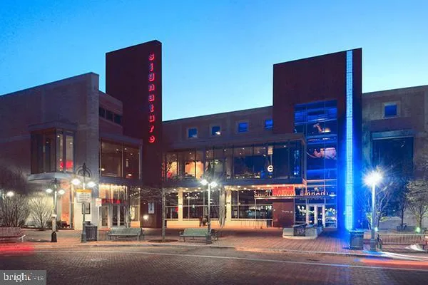 a front view of a building with street view