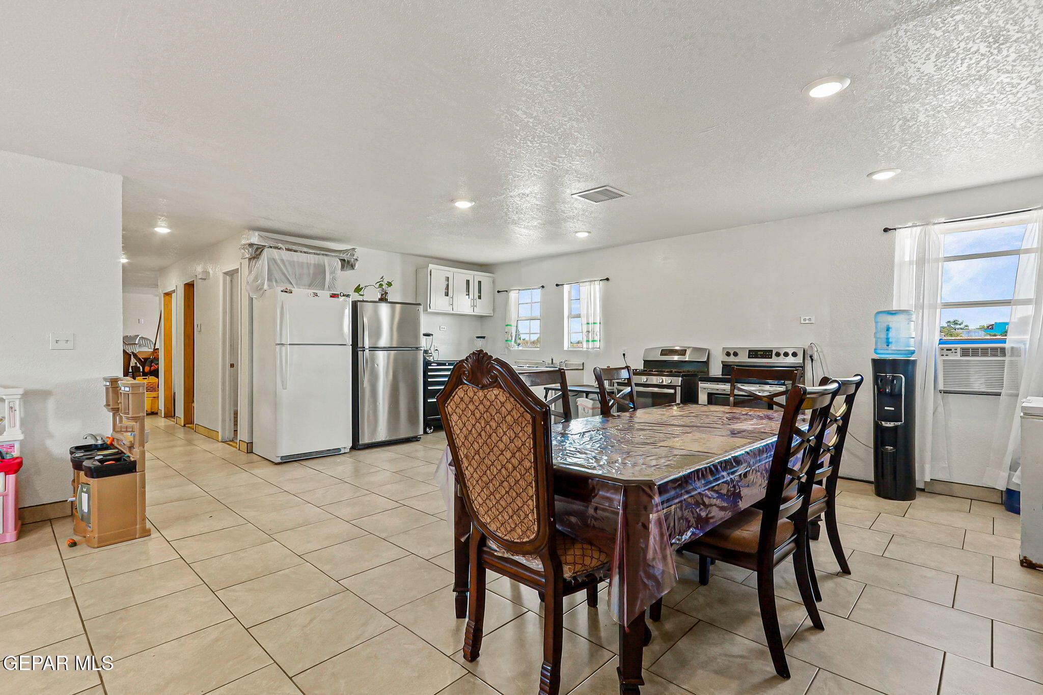 13419 Mendoza Road San Elizario, TX 79849 - Photo 16 of 55 a view of a dining room with furniture