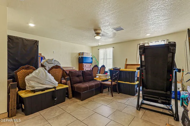 a bedroom with a bed and furniture
