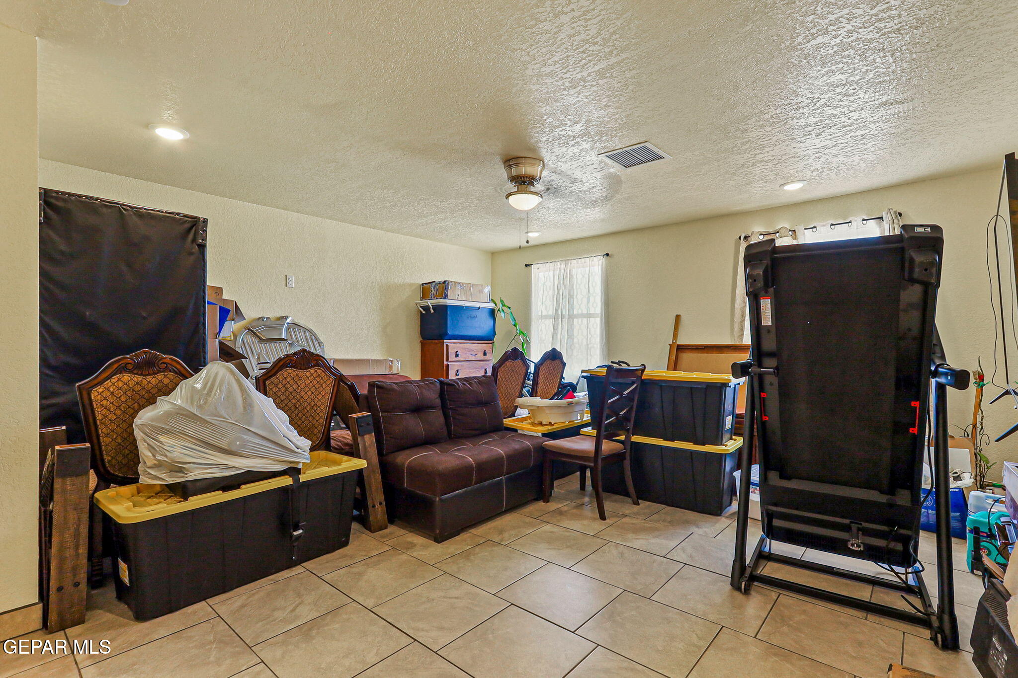 13419 Mendoza Road San Elizario, TX 79849 - Photo 28 of 55 a living room with furniture