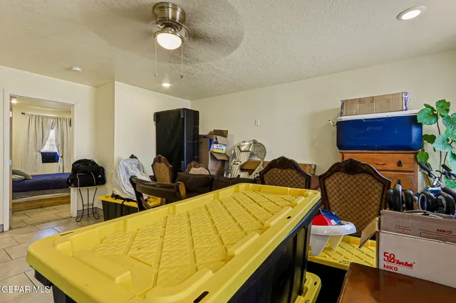 a bedroom with furniture and a bed