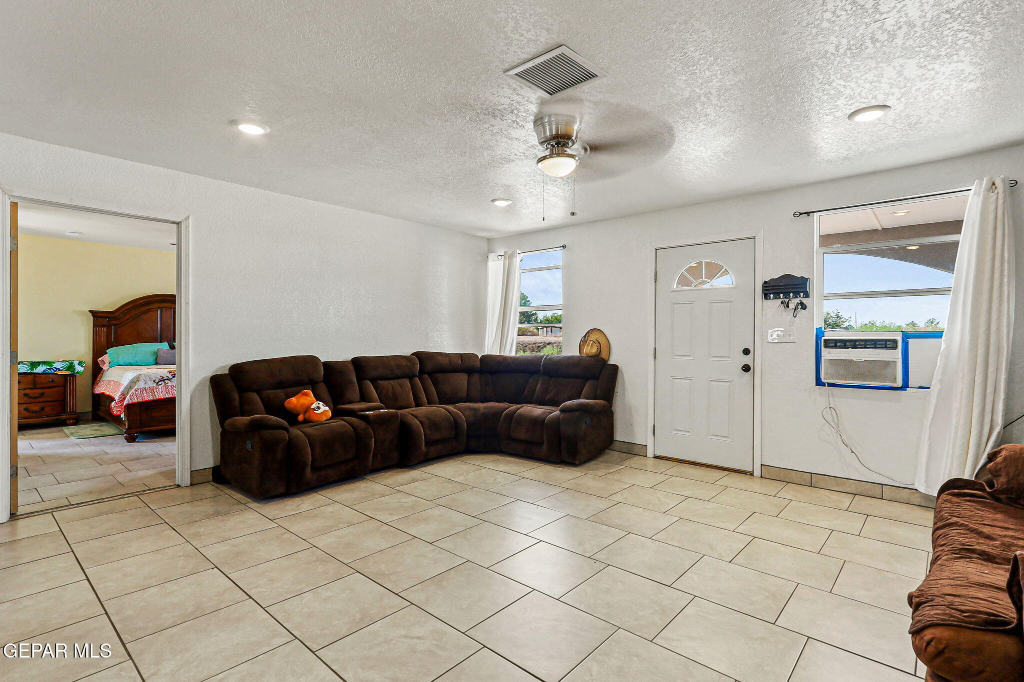 13419 Mendoza Road San Elizario, TX 79849 - Photo 5 of 55 a living room with furniture