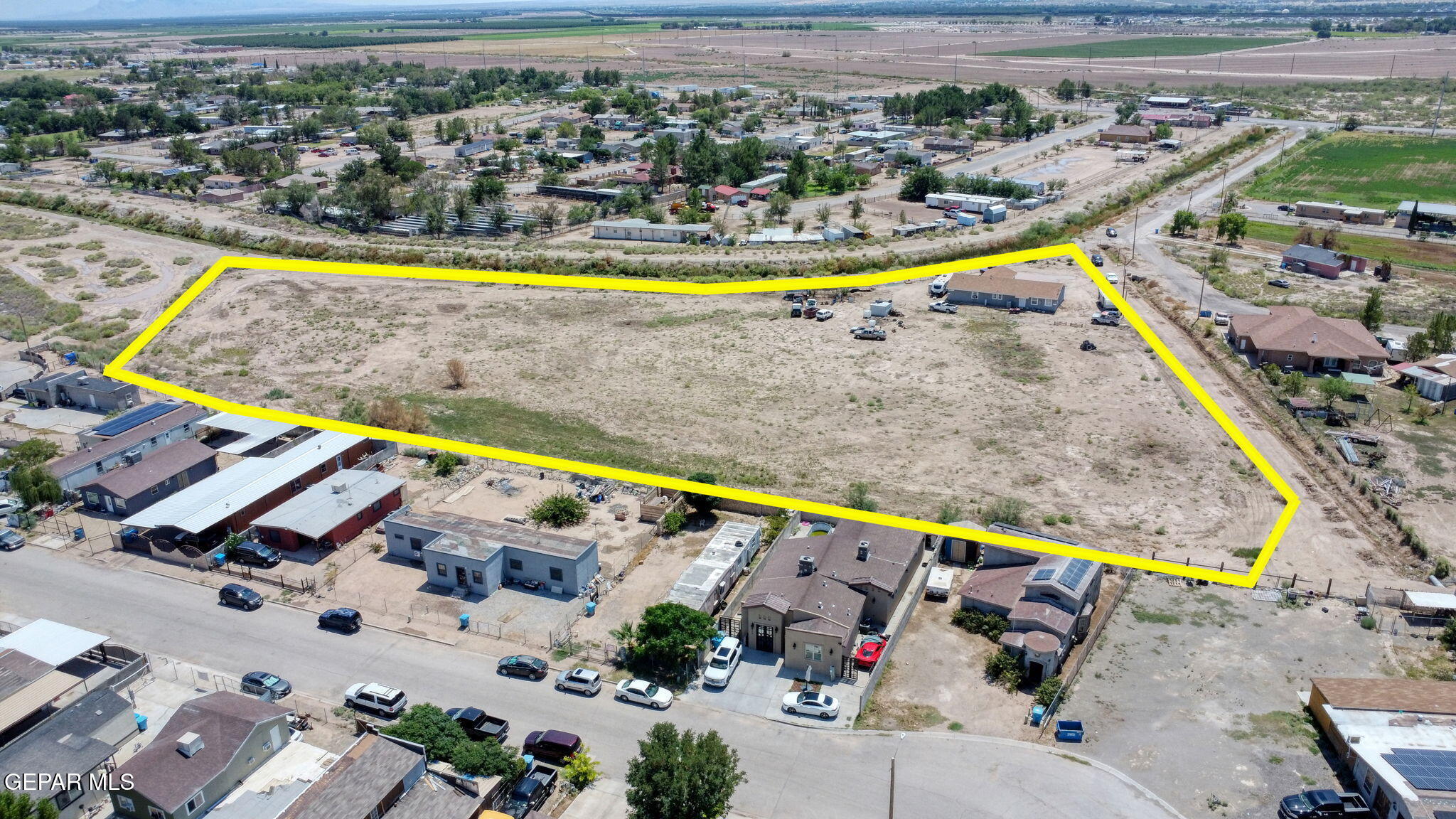 13419 Mendoza Road San Elizario, TX 79849 - Photo 52 of 55 an aerial view of swimming pool with outdoor seating