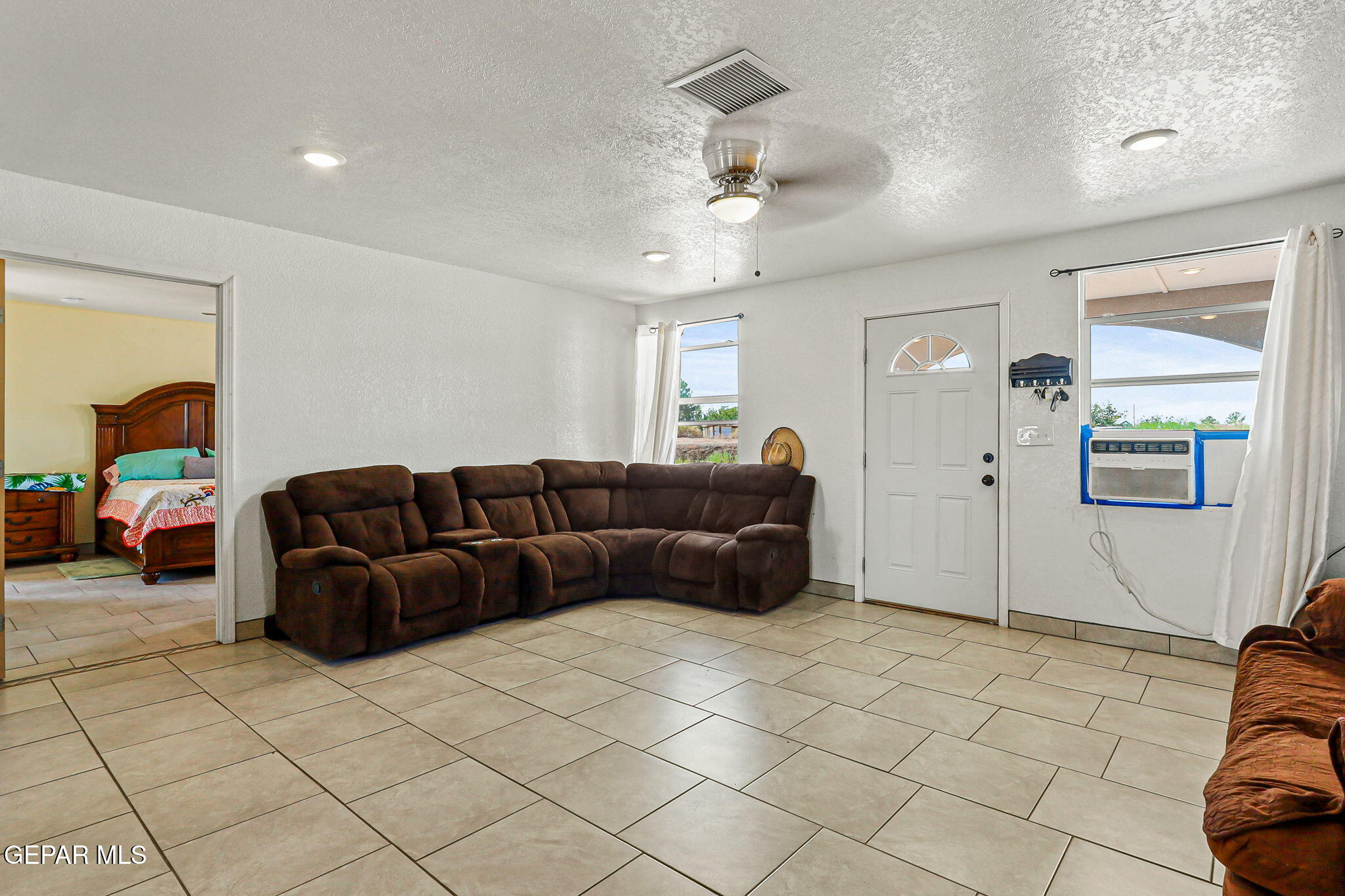 13419 Mendoza Road San Elizario, TX 79849 - Photo 6 of 55 a living room with furniture
