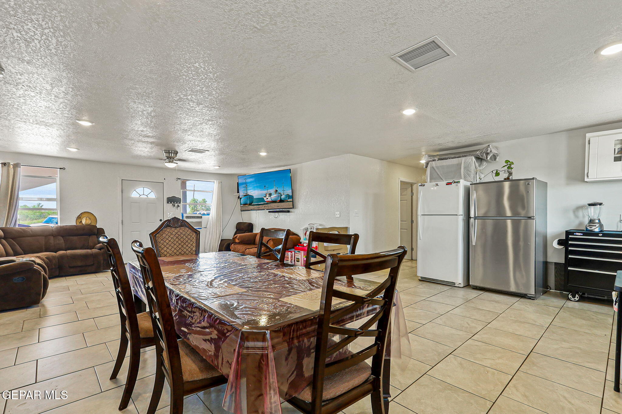 13419 Mendoza Road San Elizario, TX 79849 - Photo 8 of 55 a view of a dining room with furniture