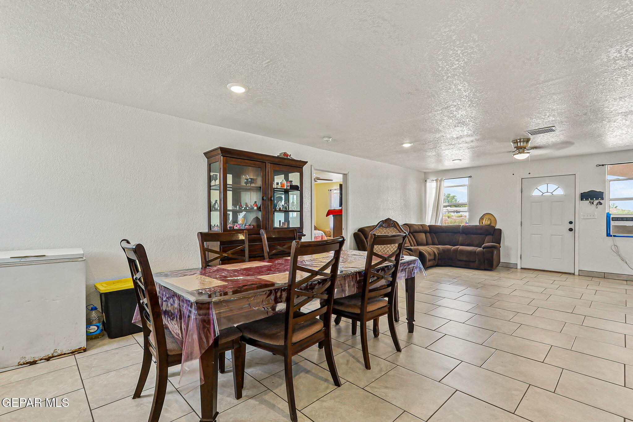 13419 Mendoza Road San Elizario, TX 79849 - Photo 9 of 55 a view of a dining room with furniture