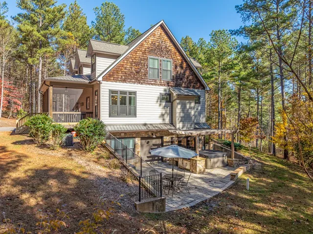 a view of a forest with a mountain in the background