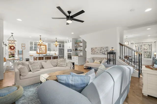 a bedroom with a large bed and a dresser