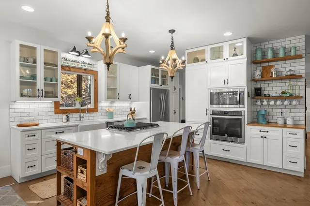 a balcony with chairs and with wooden floor