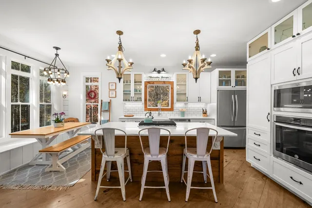 a bathroom with a bathtub and shower