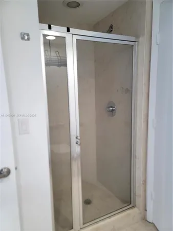 a view of an empty room with closet