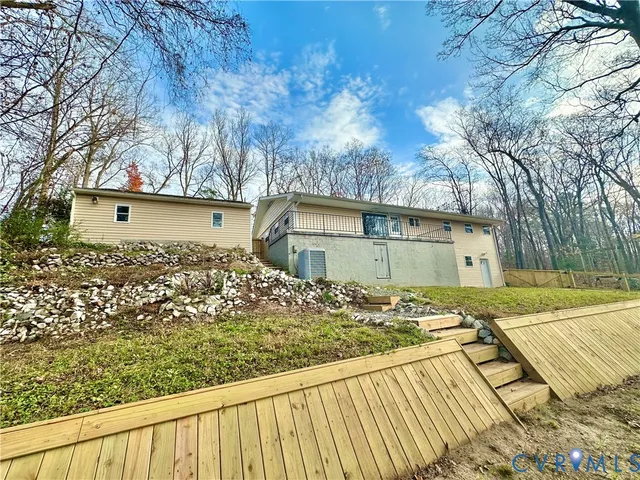 a view of a yard with large tree