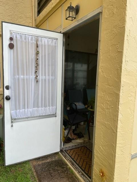9273 Southwest 8th Street, Unit 119 Boca Raton, FL 33428 - Photo 28 of 33 DOOR TO THE GREENERY