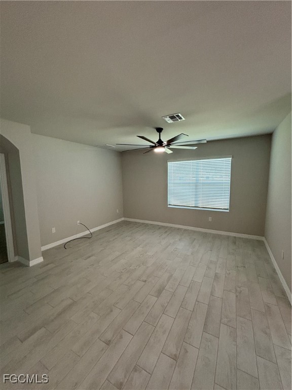 20461 Camino Torcido Loop North Fort Myers, FL 33917 - Photo 12 of 17 an empty room with a empty space and windows