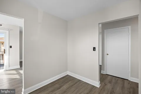 a view of small space with wooden floor
