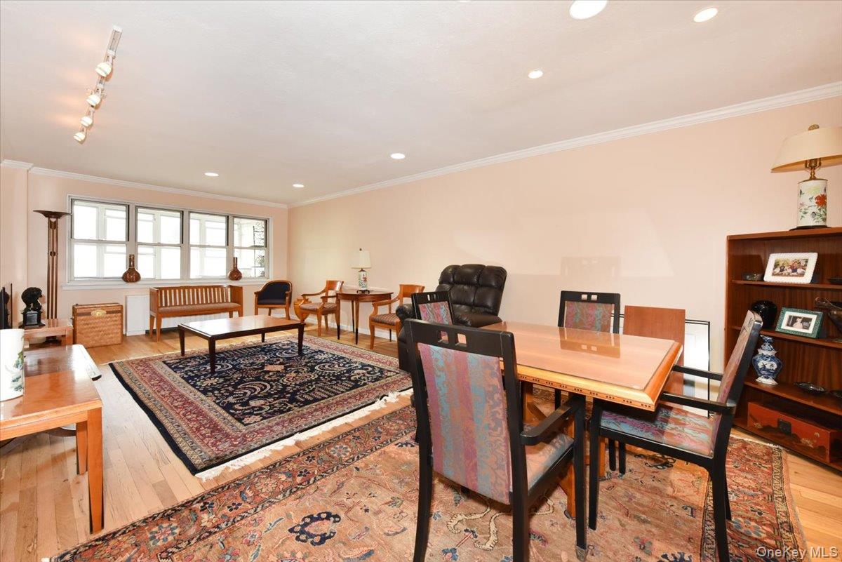 180 South Middle Neck Road, Unit 3K Great Neck, NY 11021 - Photo 11 of 20 Living/Dining Room with Screen Porch