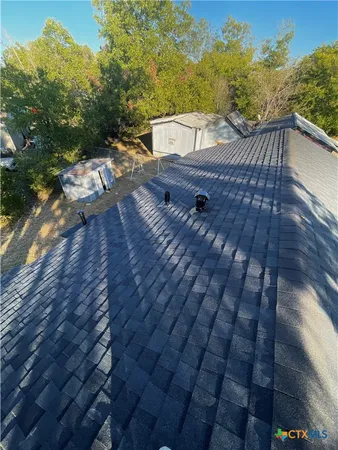 a view of balcony with wooden floor and outdoor space