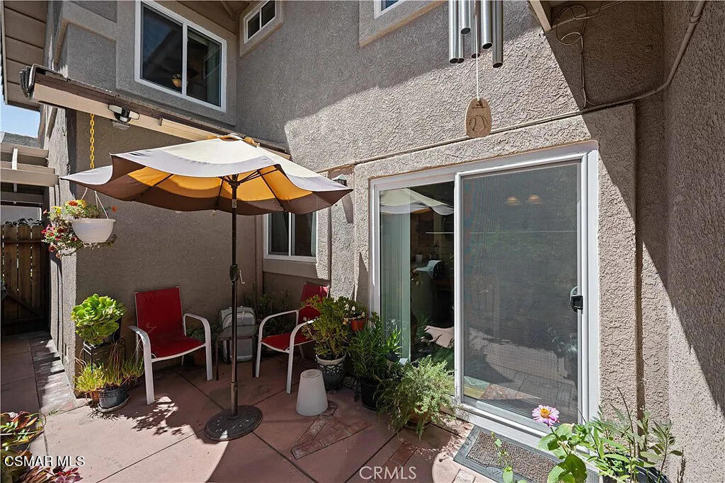 4492 Apricot Road, Unit B Simi Valley, CA 93063 - Photo 12 of 24 a view of a patio with chairs and potted plants