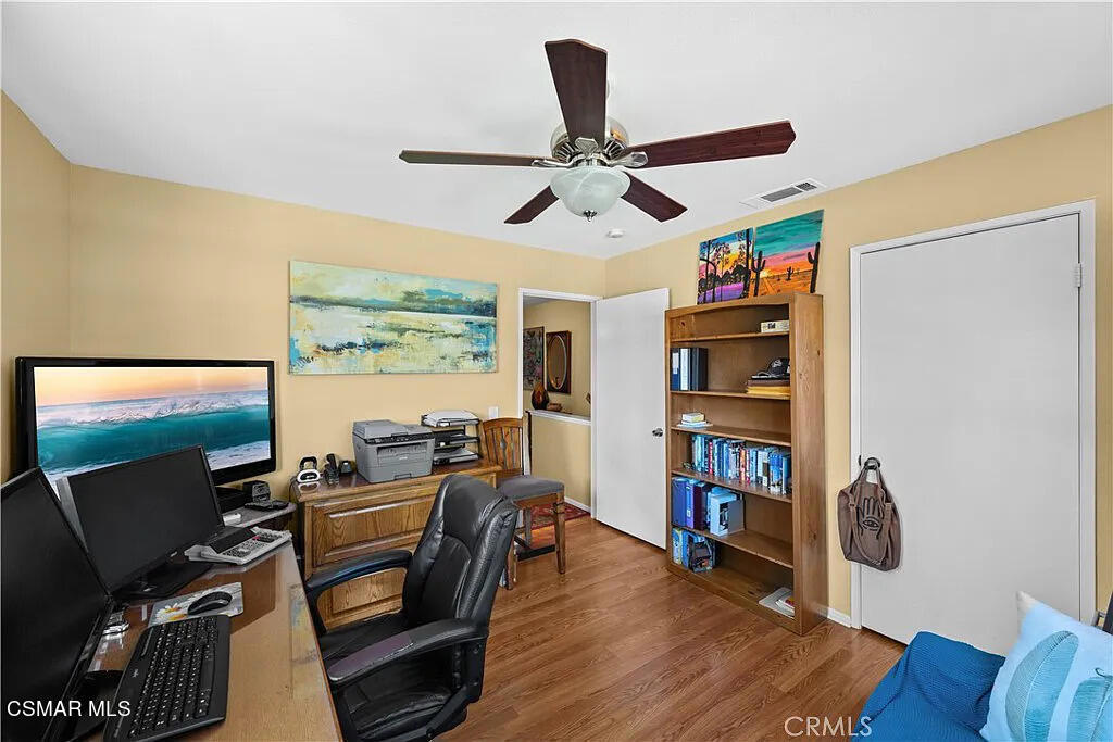 4492 Apricot Road, Unit B Simi Valley, CA 93063 - Photo 18 of 24 a work room with furniture and a flat screen tv