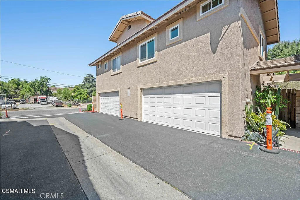 4492 Apricot Road, Unit B Simi Valley, CA 93063 - Photo 22 of 24 a view of a house with a street