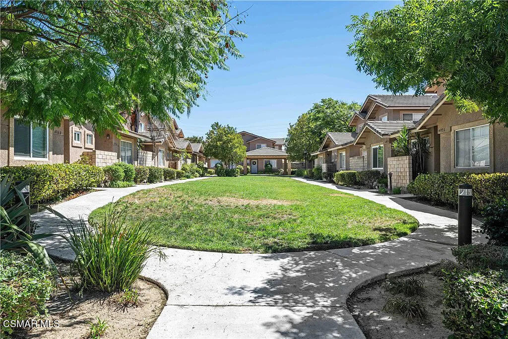 4492 Apricot Road, Unit B Simi Valley, CA 93063 - Photo 23 of 24 a front view of a house with a yard