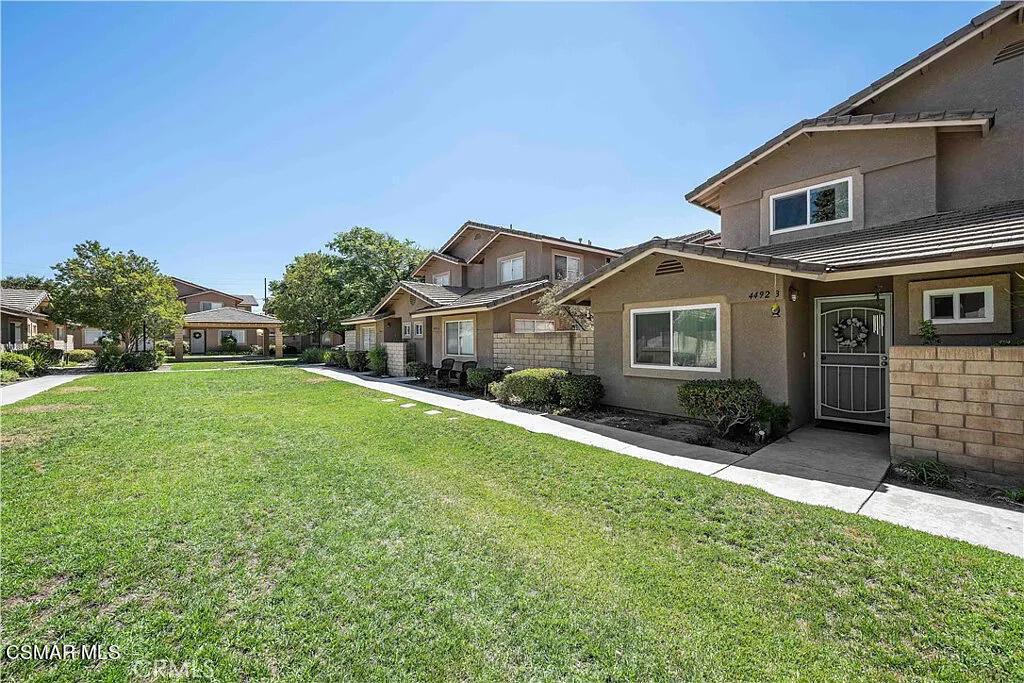 4492 Apricot Road, Unit B Simi Valley, CA 93063 - Photo 24 of 24 a front view of house with yard and green space