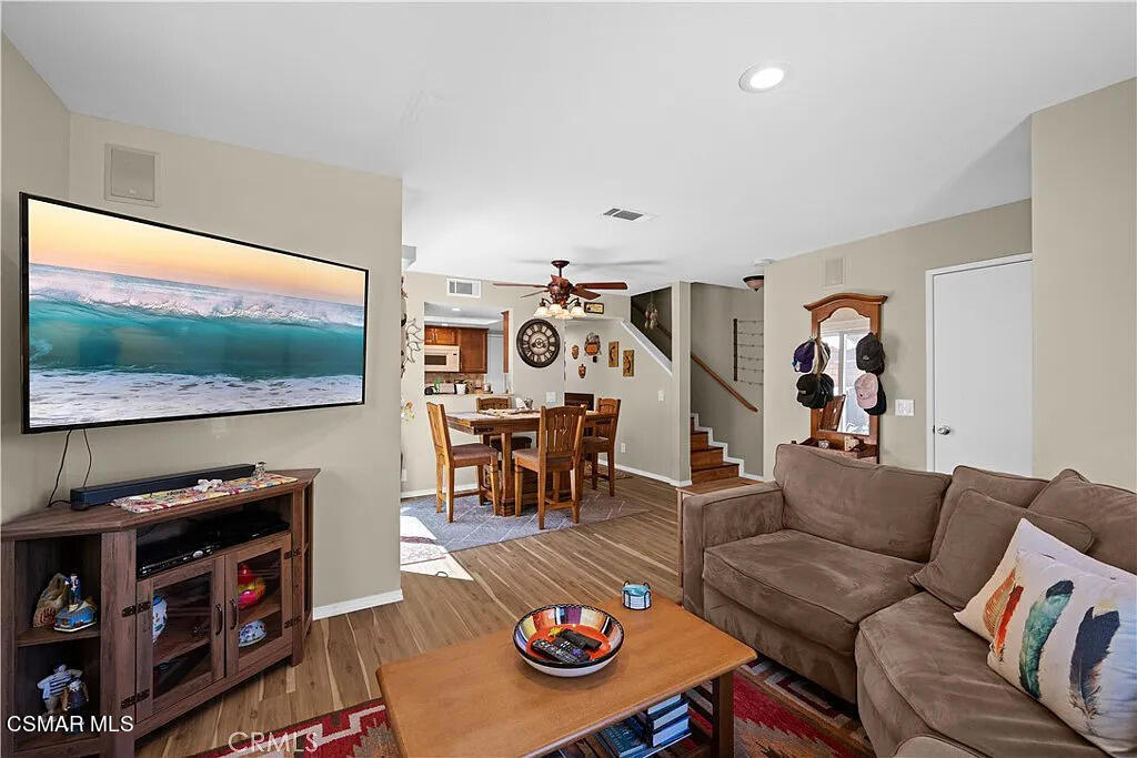 4492 Apricot Road, Unit B Simi Valley, CA 93063 - Photo 3 of 24 a living room with furniture and a flat screen tv