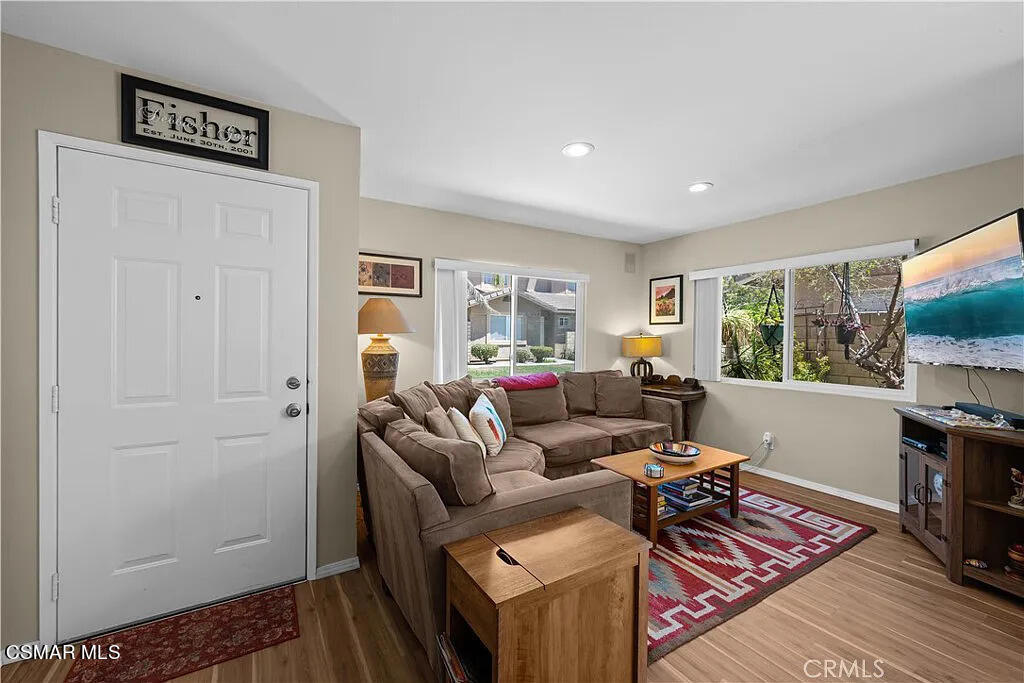 4492 Apricot Road, Unit B Simi Valley, CA 93063 - Photo 4 of 24 a living room with furniture and a flat screen tv
