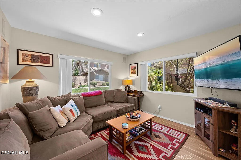 4492 Apricot Road, Unit B Simi Valley, CA 93063 - Photo 5 of 24 a living room with furniture and a flat screen tv