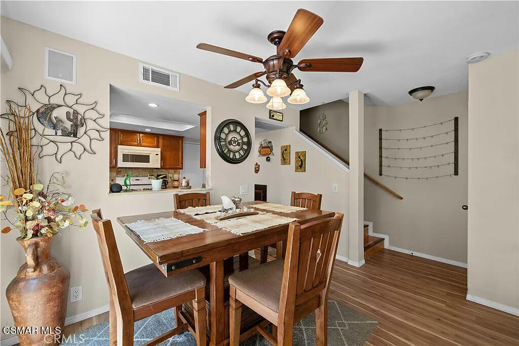 4492 Apricot Road, Unit B Simi Valley, CA 93063 - Photo 6 of 24 a view of a dining table and chairs in a room
