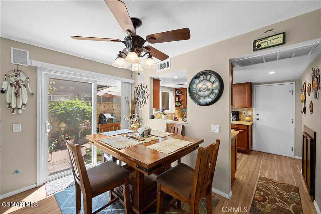 4492 Apricot Road, Unit B Simi Valley, CA 93063 - Photo 7 of 24 a view of a dining area with furniture window and wooden floor
