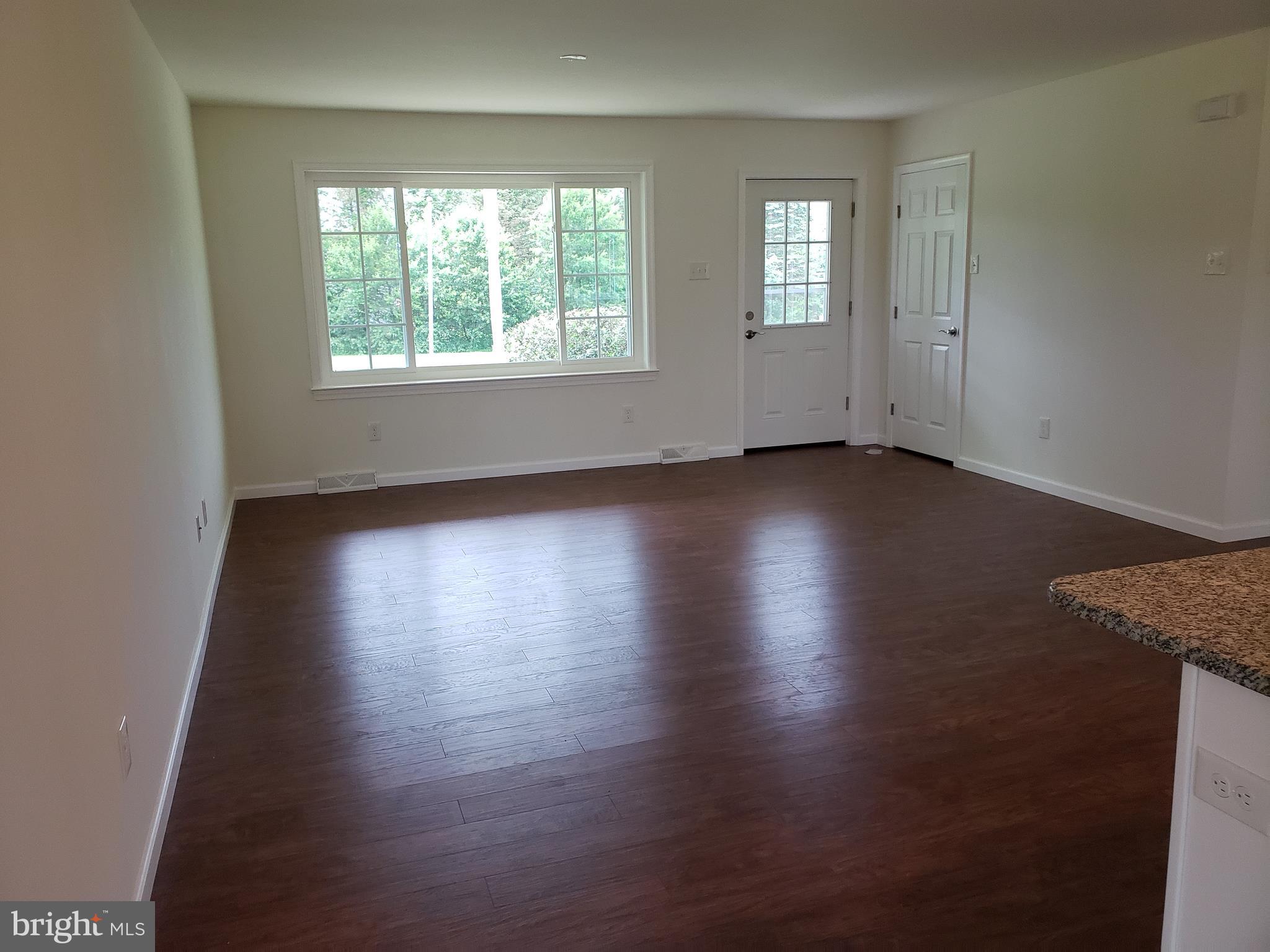 283 Ash Road Coatesville, PA 19320 - Photo 9 of 24 Great Room~/ Front Door Entry new hardwood floors