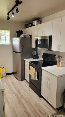 a view of a hallway with closet