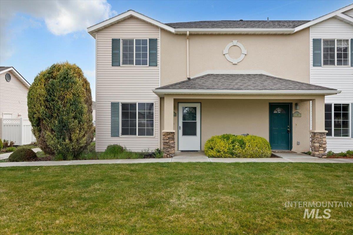 1897 Hampton Way Twin Falls, ID 83301 - Photo 1 of 48 Traditional home with a shingled roof, stucco siding, and stone siding