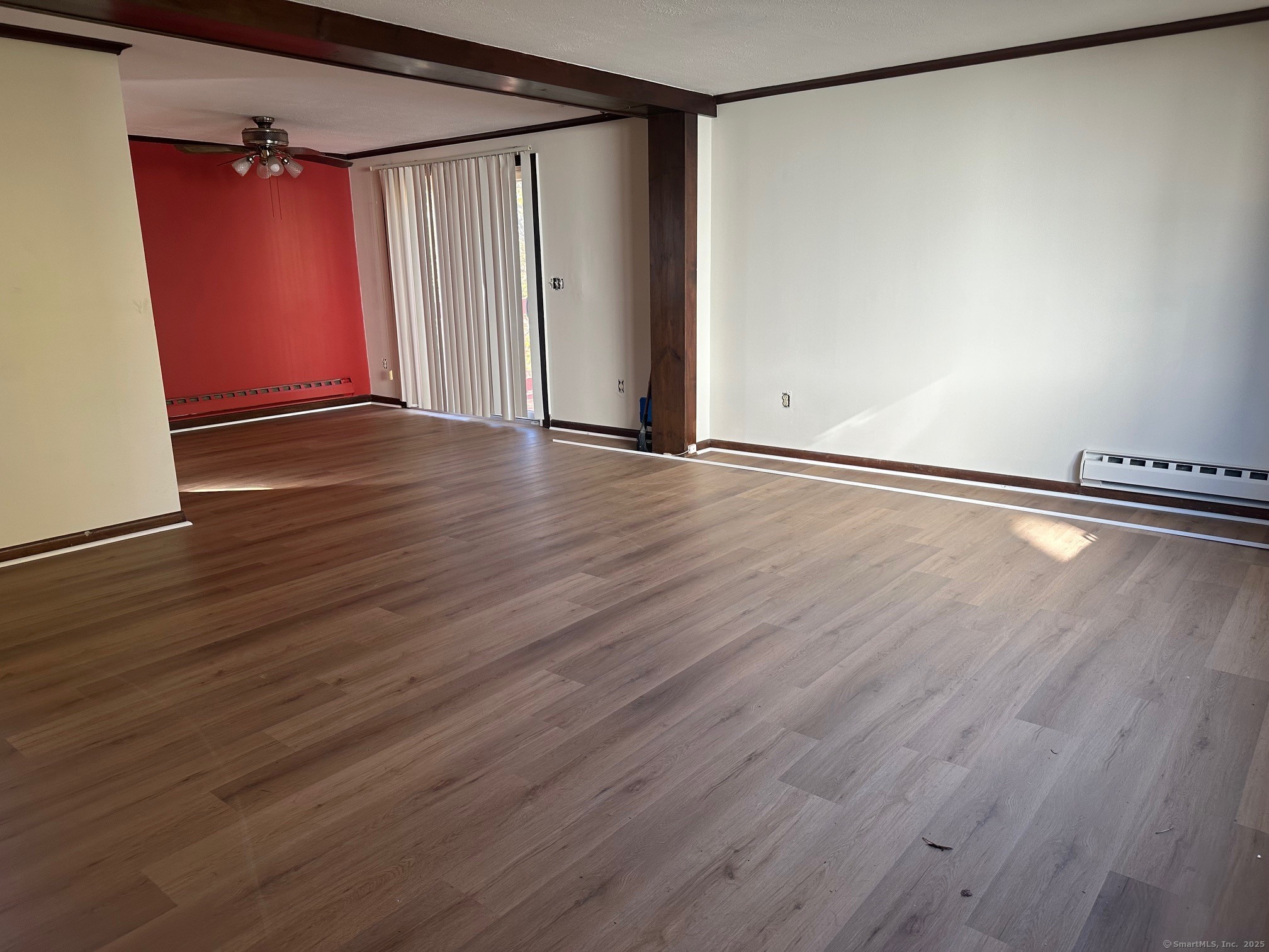 60 Coolidge Street Hartford, CT 06106 - Photo 4 of 13 a view of an empty room with wooden floor