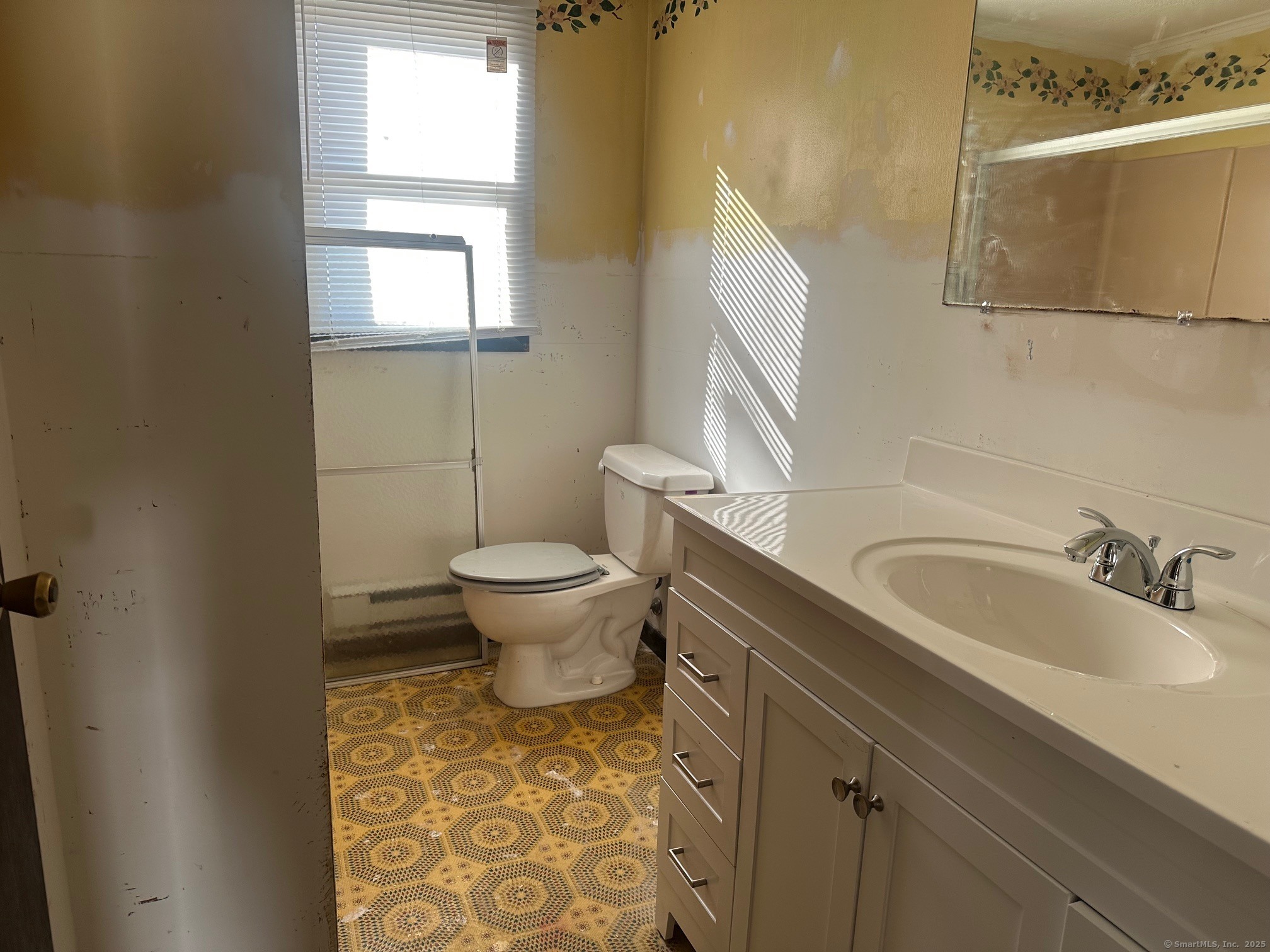 60 Coolidge Street Hartford, CT 06106 - Photo 7 of 13 a bathroom with a sink toilet and mirror