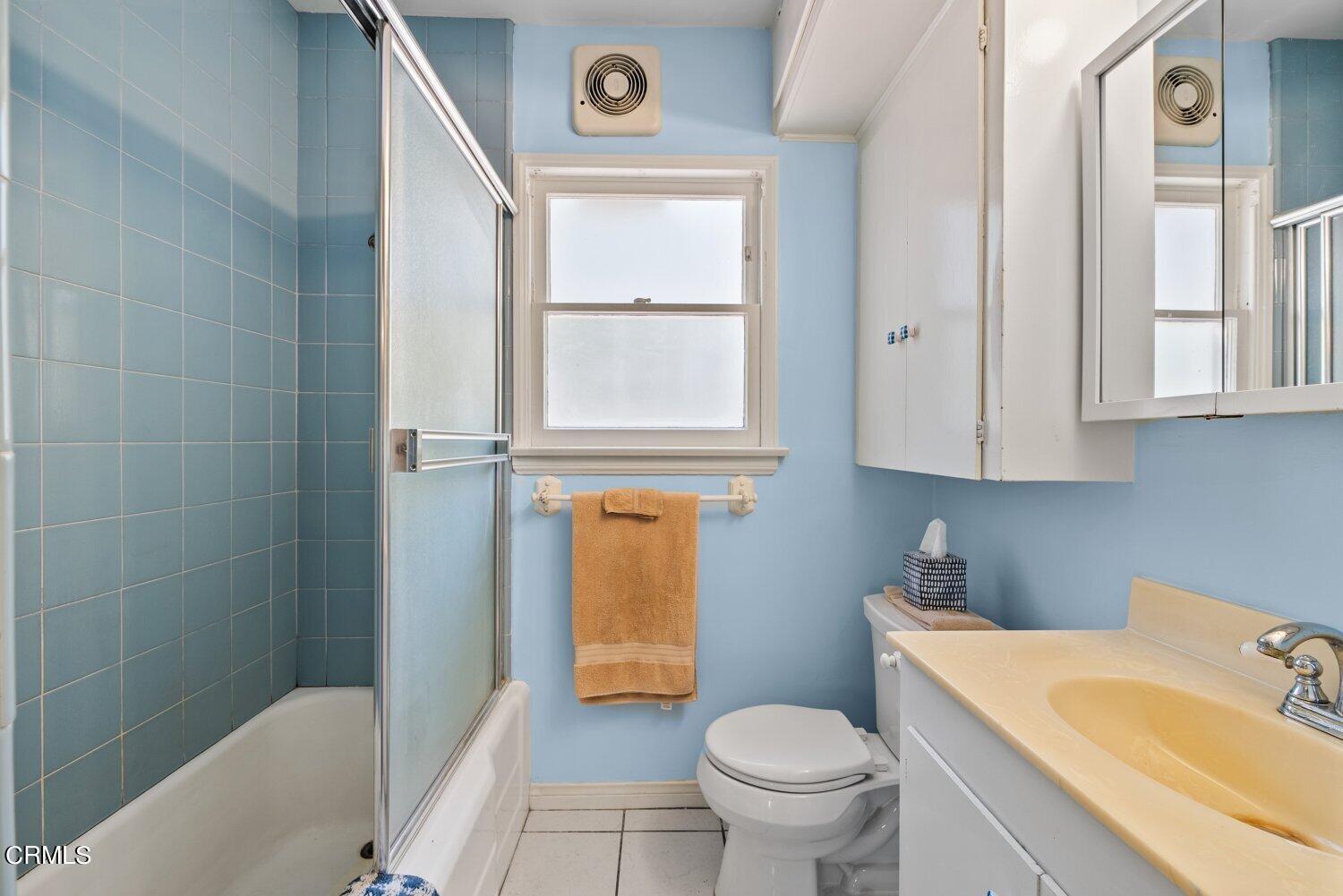 1807 Alpha Road Glendale, CA 91208 - Photo 11 of 26 a bathroom with a sink a toilet and tub