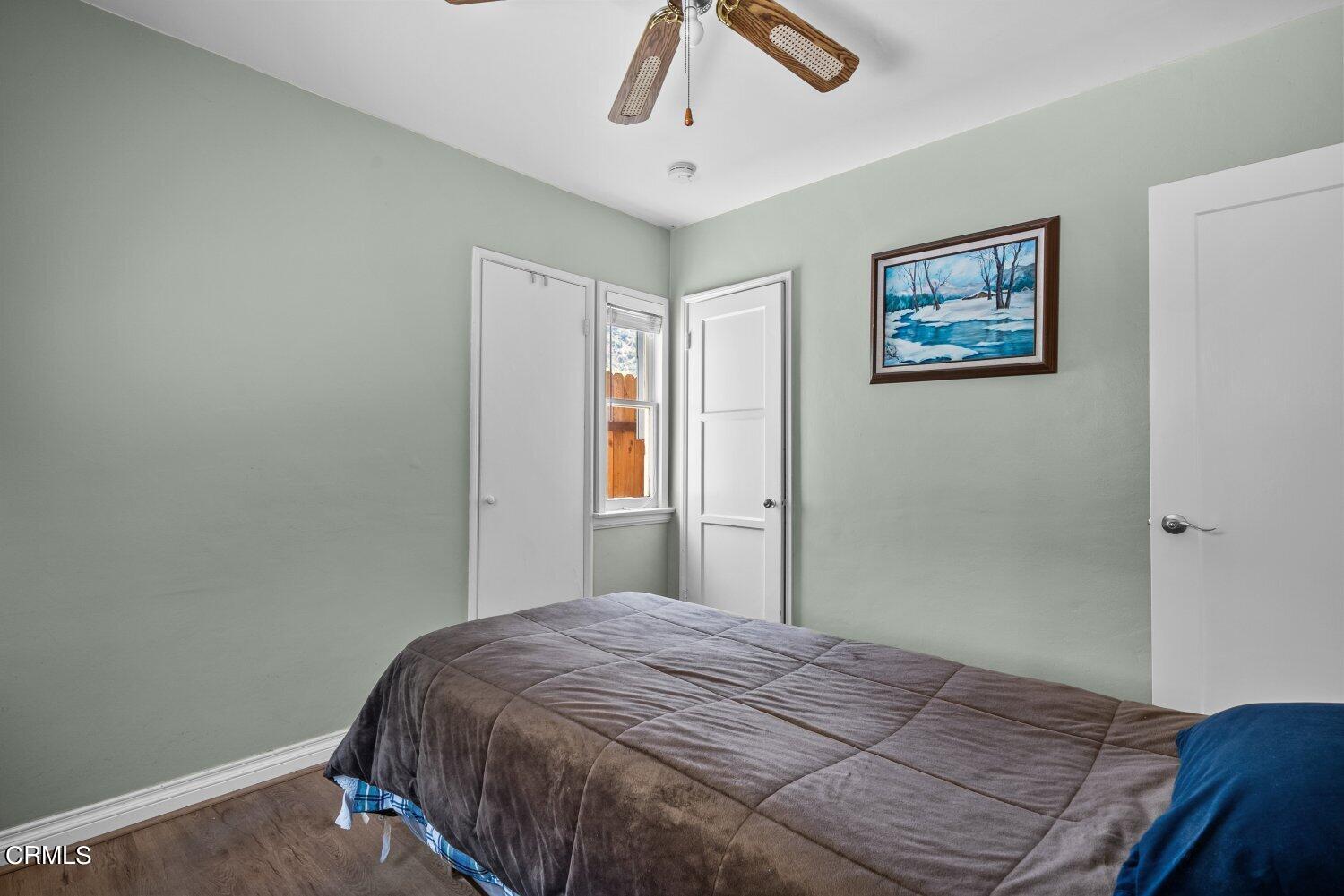1807 Alpha Road Glendale, CA 91208 - Photo 13 of 26 a bedroom with a bed and a window