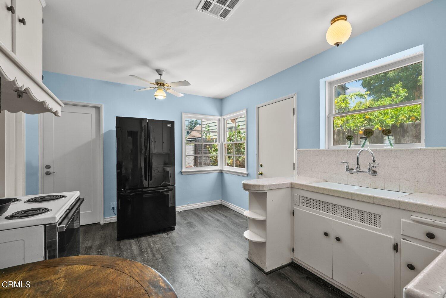 1807 Alpha Road Glendale, CA 91208 - Photo 15 of 26 a kitchen with a refrigerator and a sink