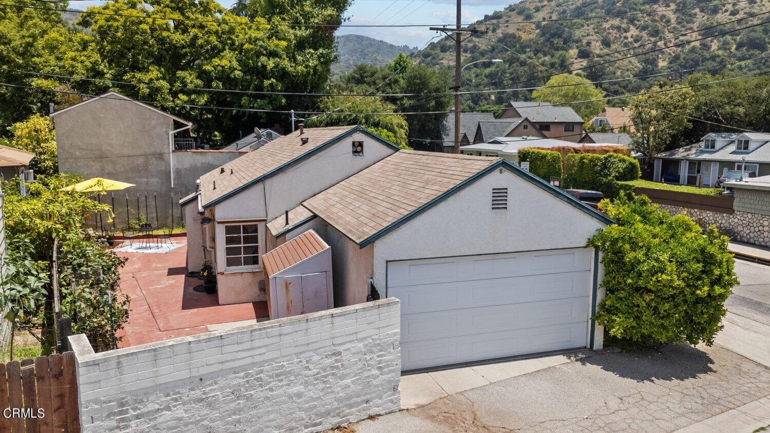 1807 Alpha Road Glendale, CA 91208 - Photo 22 of 26 a view of a house with a yard and garage