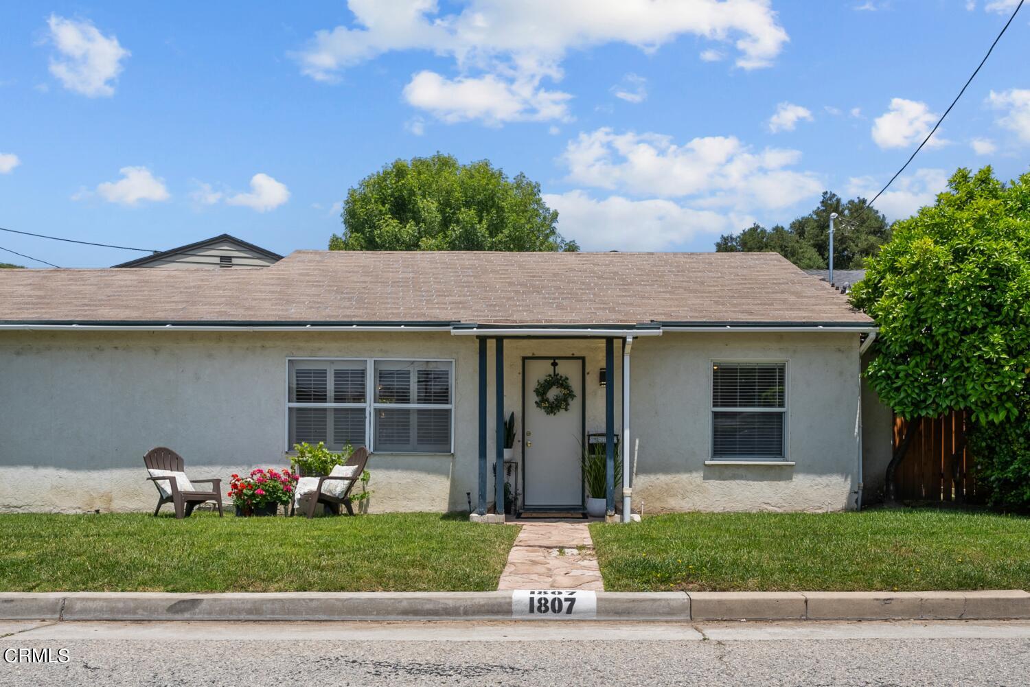 1807 Alpha Road Glendale, CA 91208 - Photo 26 of 26 a front view of a house with a garden and plants