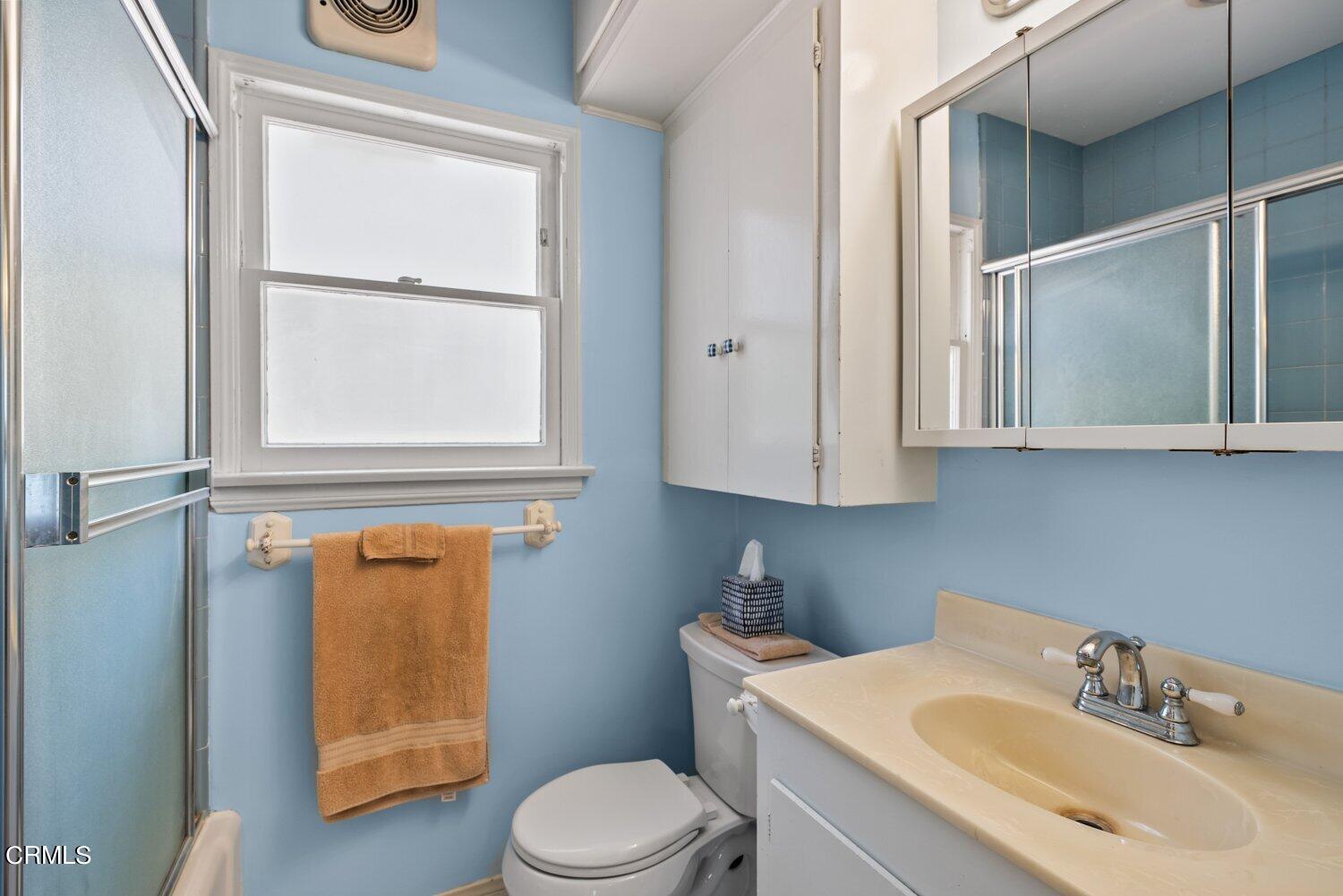 1807 Alpha Road Glendale, CA 91208 - Photo 10 of 26 a bathroom with a sink a toilet and shower