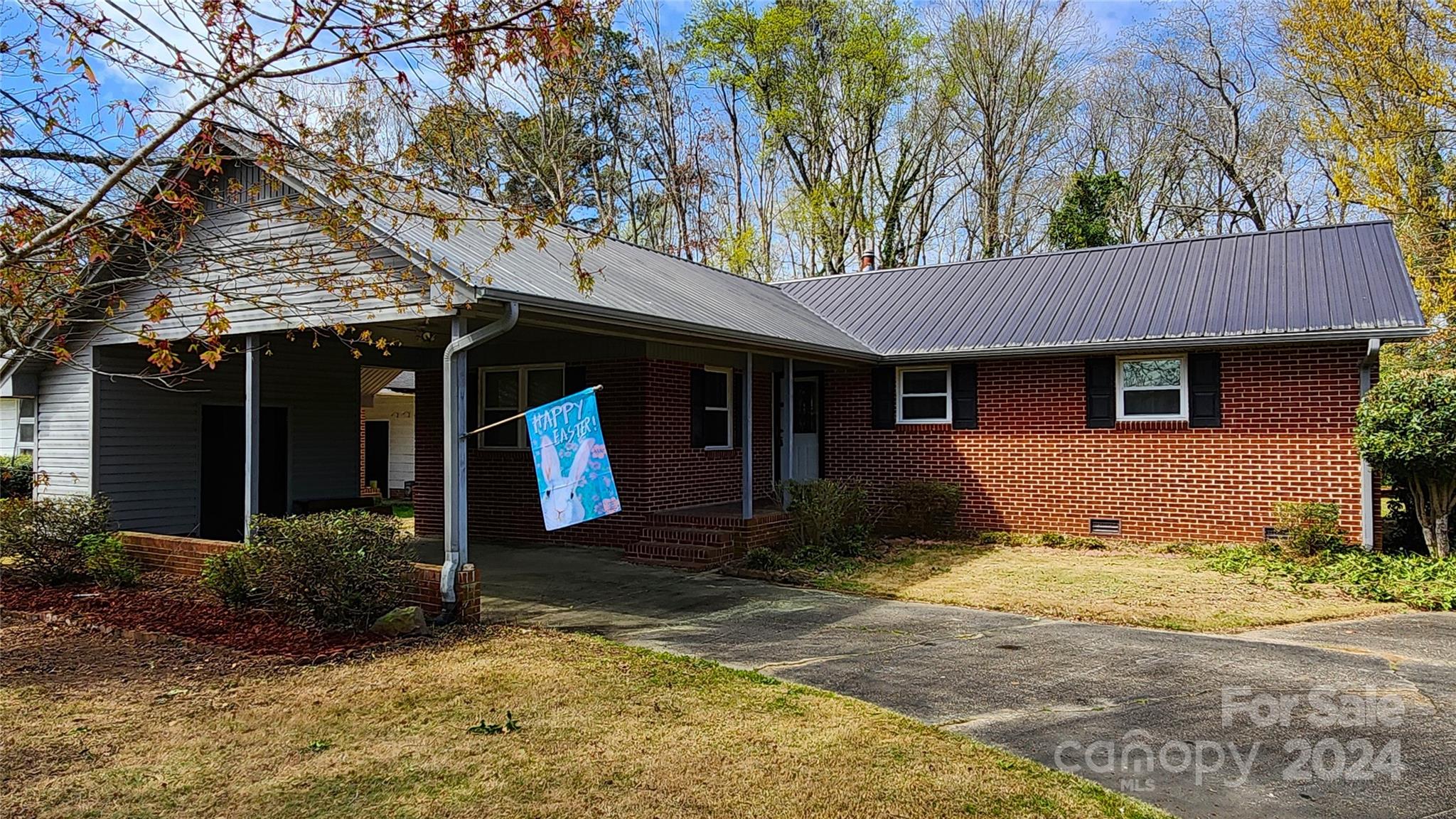 108 State Rd S-13-525 Chesterfield, SC 29709 - Photo 45 of 46 a front view of a house with garden