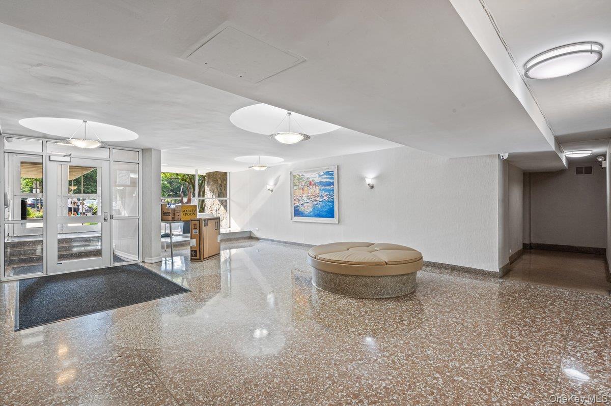 18-55 Corporal Kennedy Street, Unit 6H Queens, NY 11360 - Photo 16 of 18 Building lobby with a security system