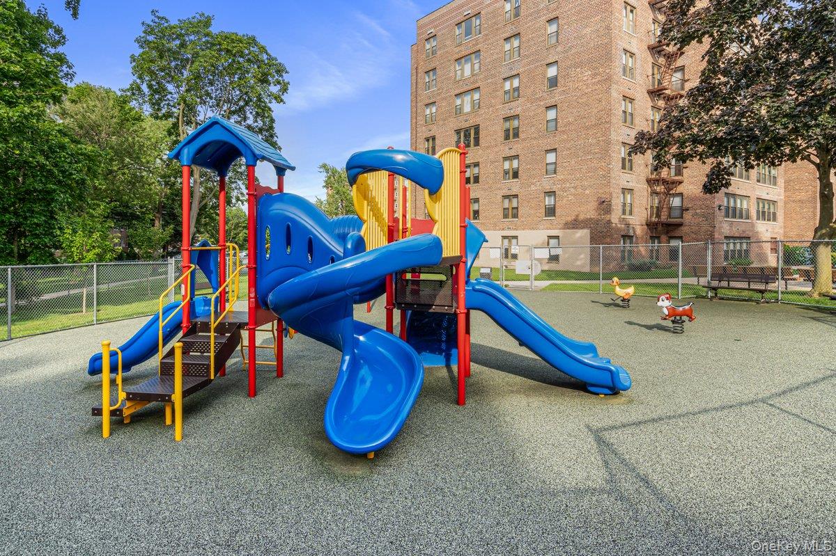 18-55 Corporal Kennedy Street, Unit 6H Queens, NY 11360 - Photo 17 of 18 View of community play area