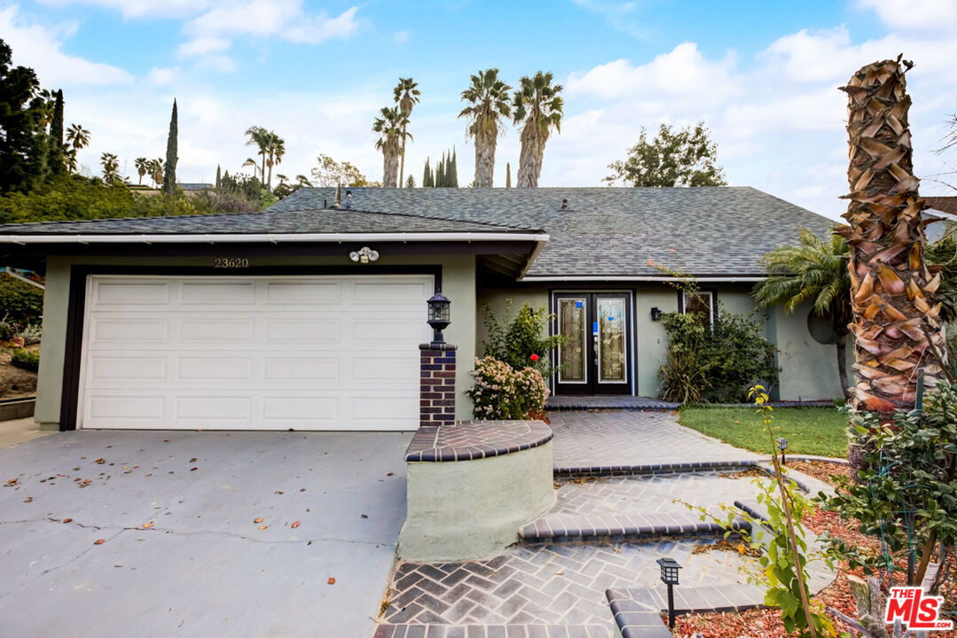 23620 Sunset Crossing Road Diamond Bar, CA 91765 - Photo 1 of 41 a front view of a house with garden
