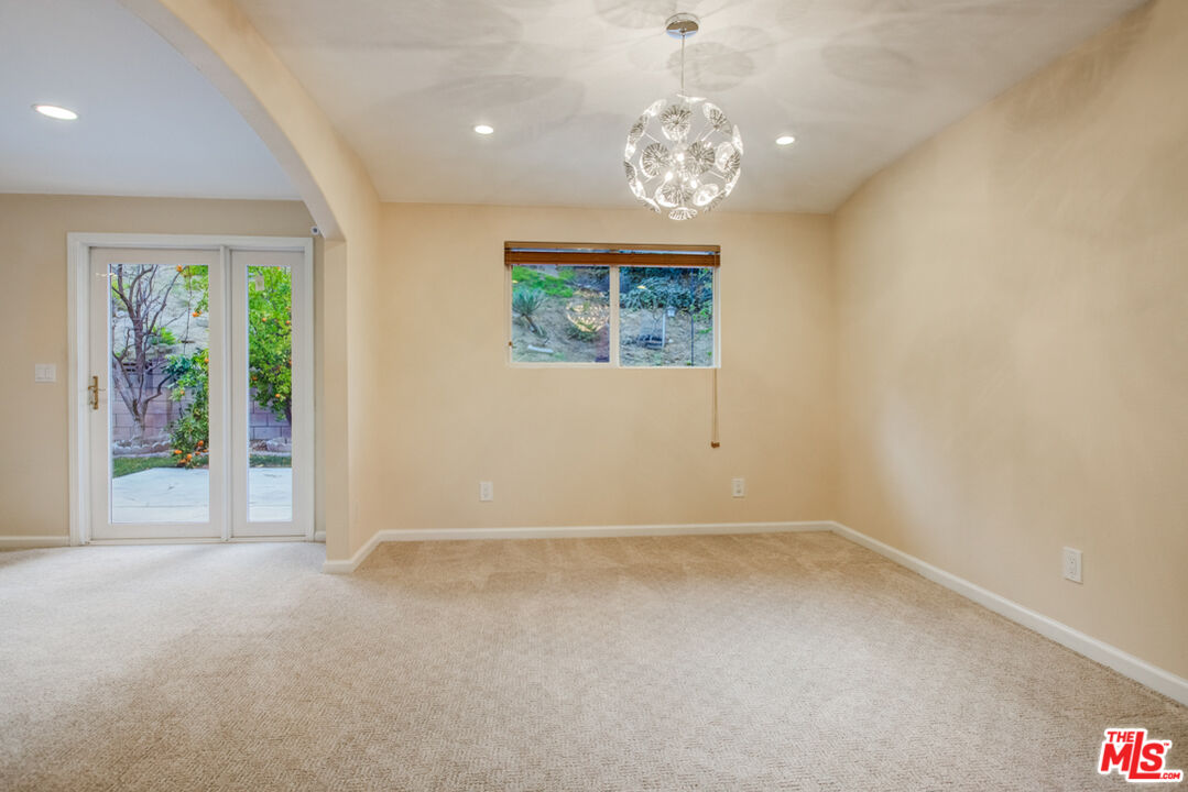 23620 Sunset Crossing Road Diamond Bar, CA 91765 - Photo 16 of 41 wooden floor in an empty room with a window