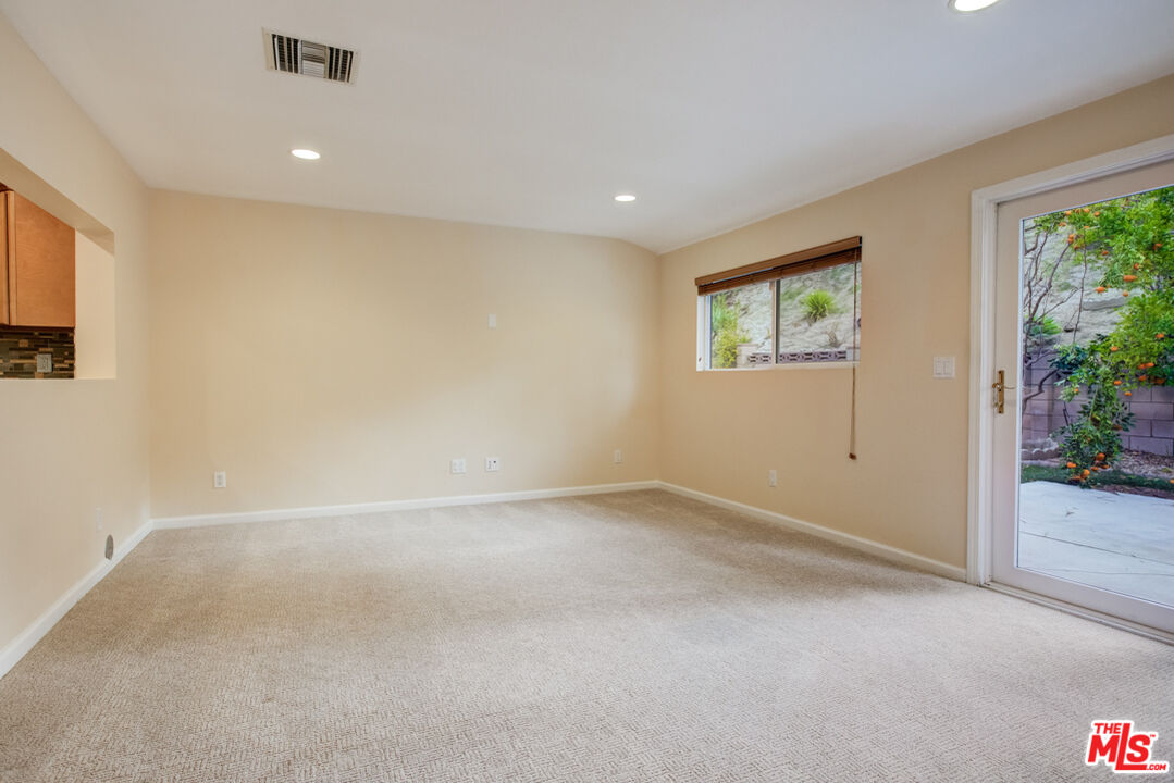 23620 Sunset Crossing Road Diamond Bar, CA 91765 - Photo 17 of 41 a view of an empty room with a window