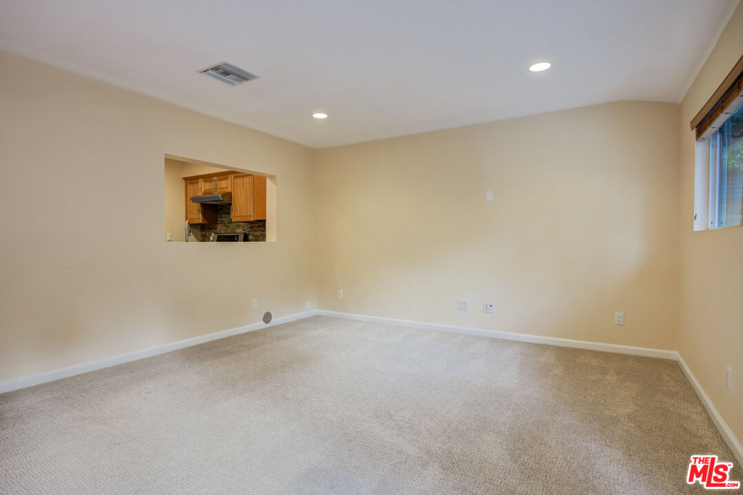 23620 Sunset Crossing Road Diamond Bar, CA 91765 - Photo 18 of 41 an empty room with windows