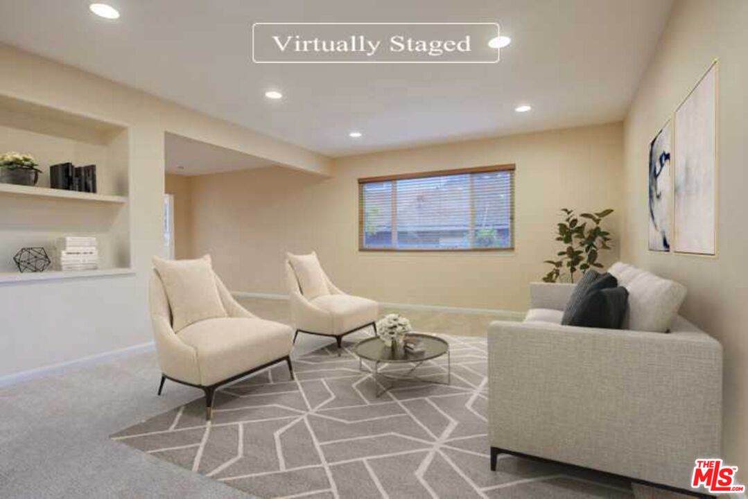 23620 Sunset Crossing Road Diamond Bar, CA 91765 - Photo 2 of 41 a living room with furniture and a potted plant